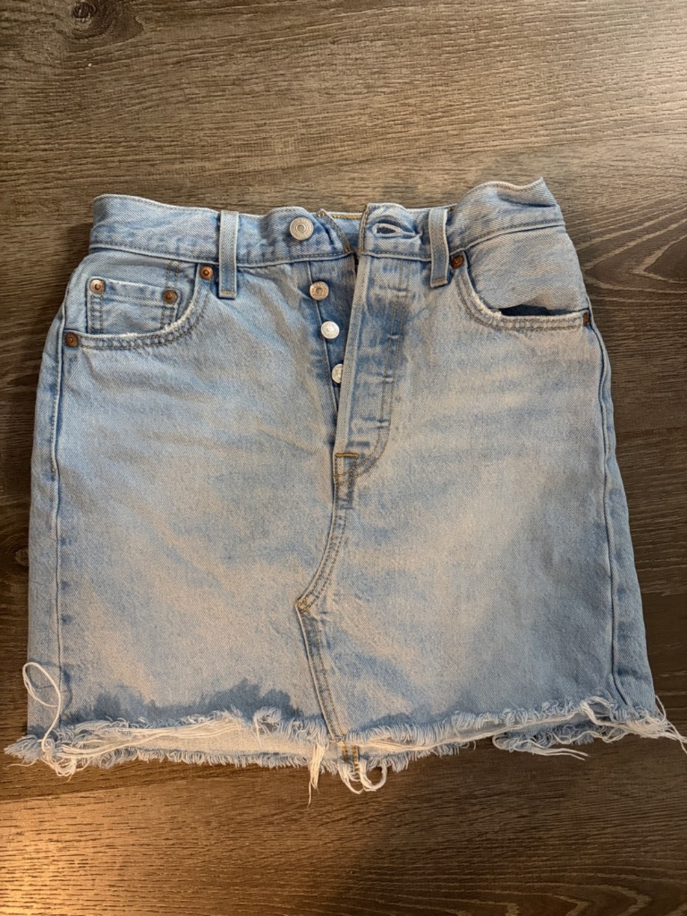 Levi’s Light Wash Denim Mini Skirt with Frayed Hem